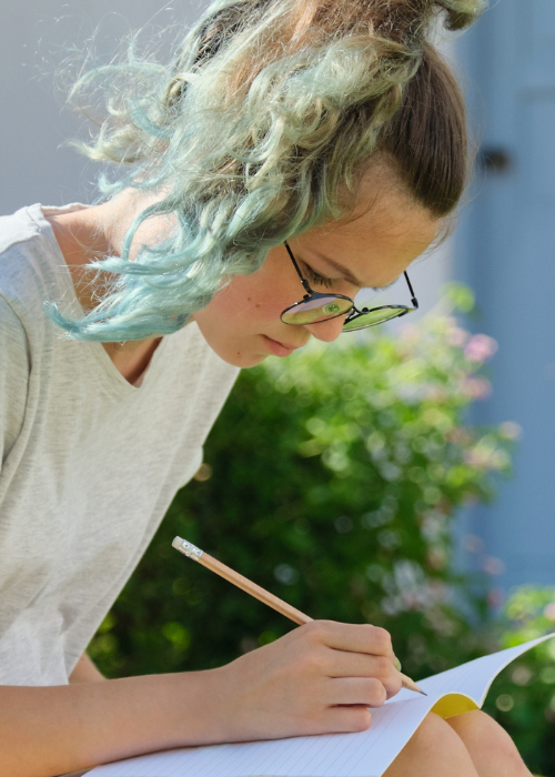 Teen Girl Writing