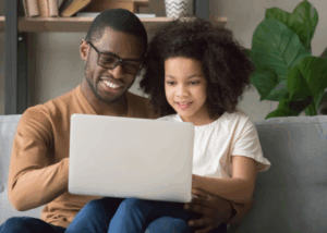 Girl and Dad Facetiming her brother