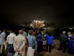 Fireworks over lake at gala